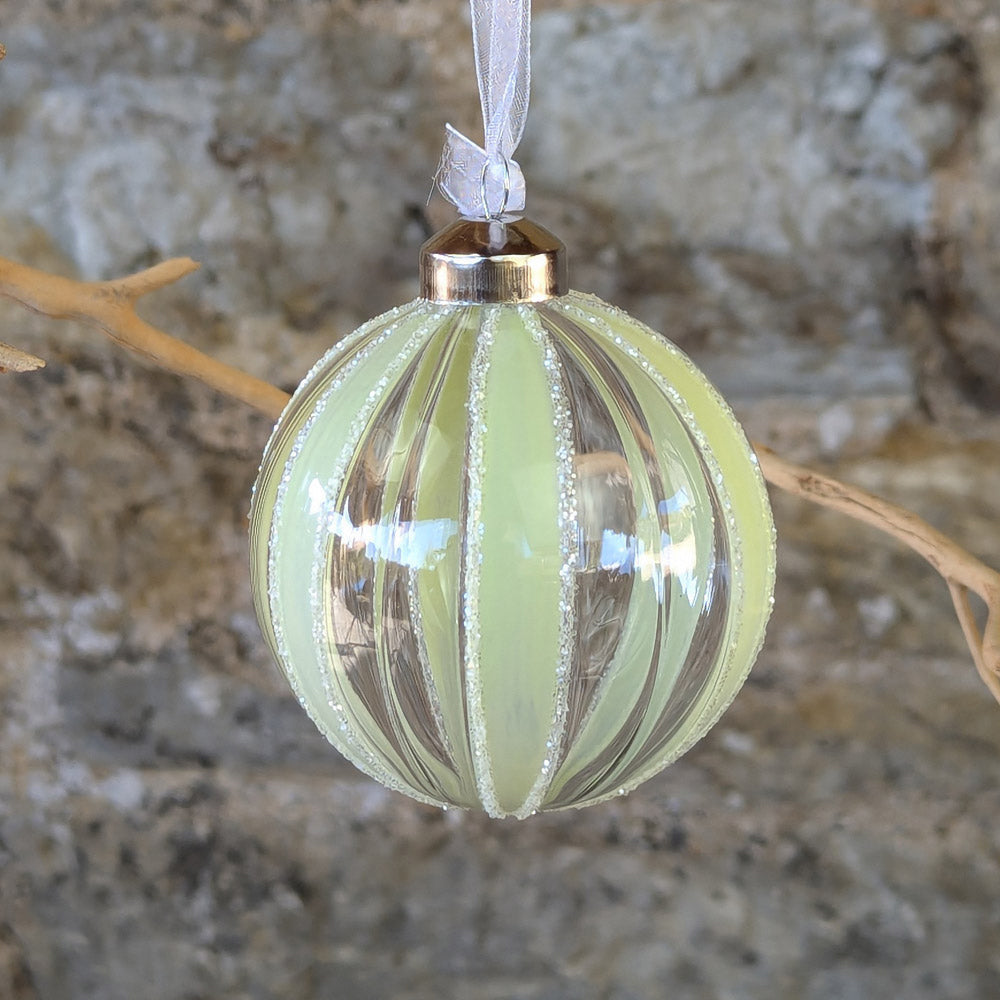 Glass Bauble with vertical stripe in pale greenwith glitter edges
