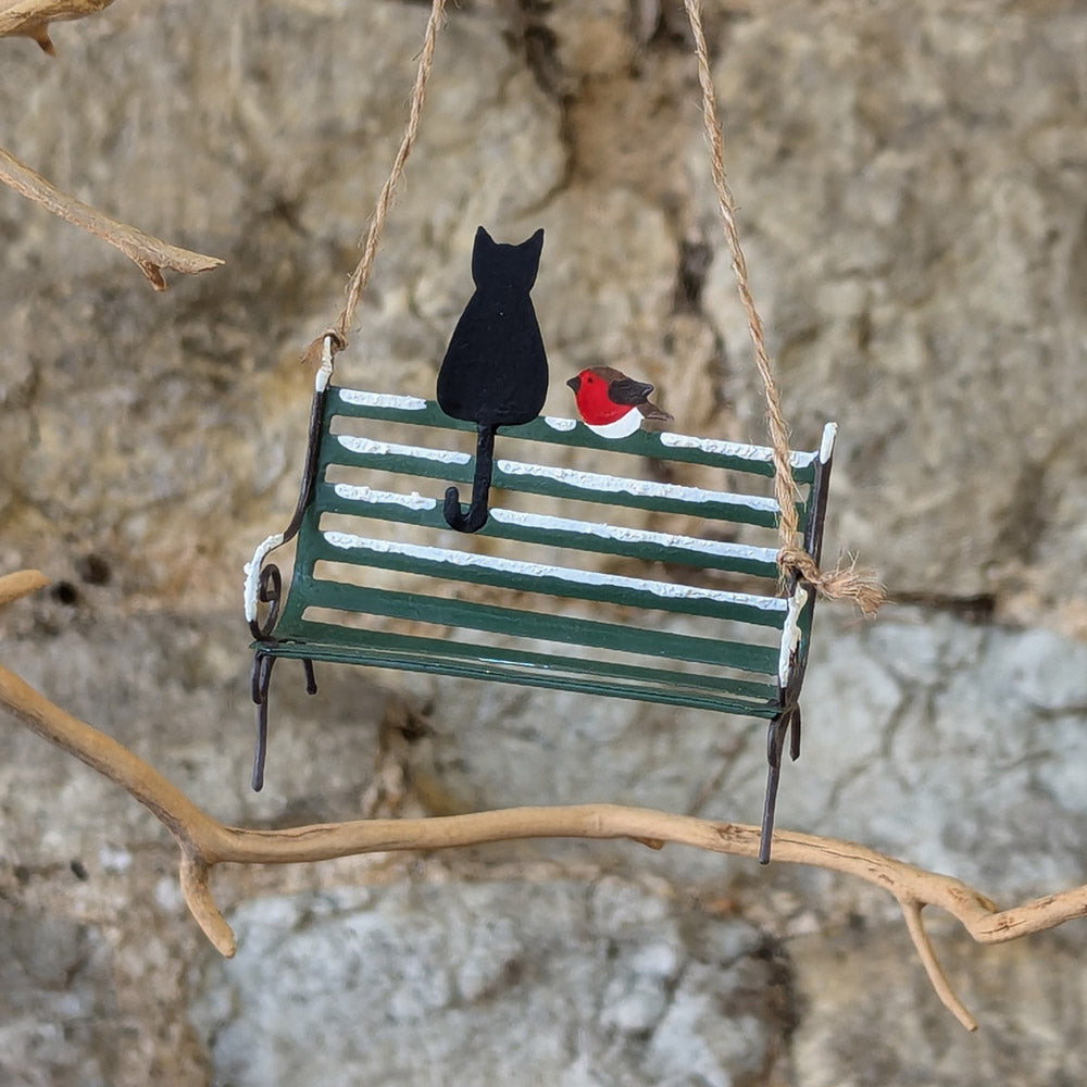Tin Black Cat On Park Bench